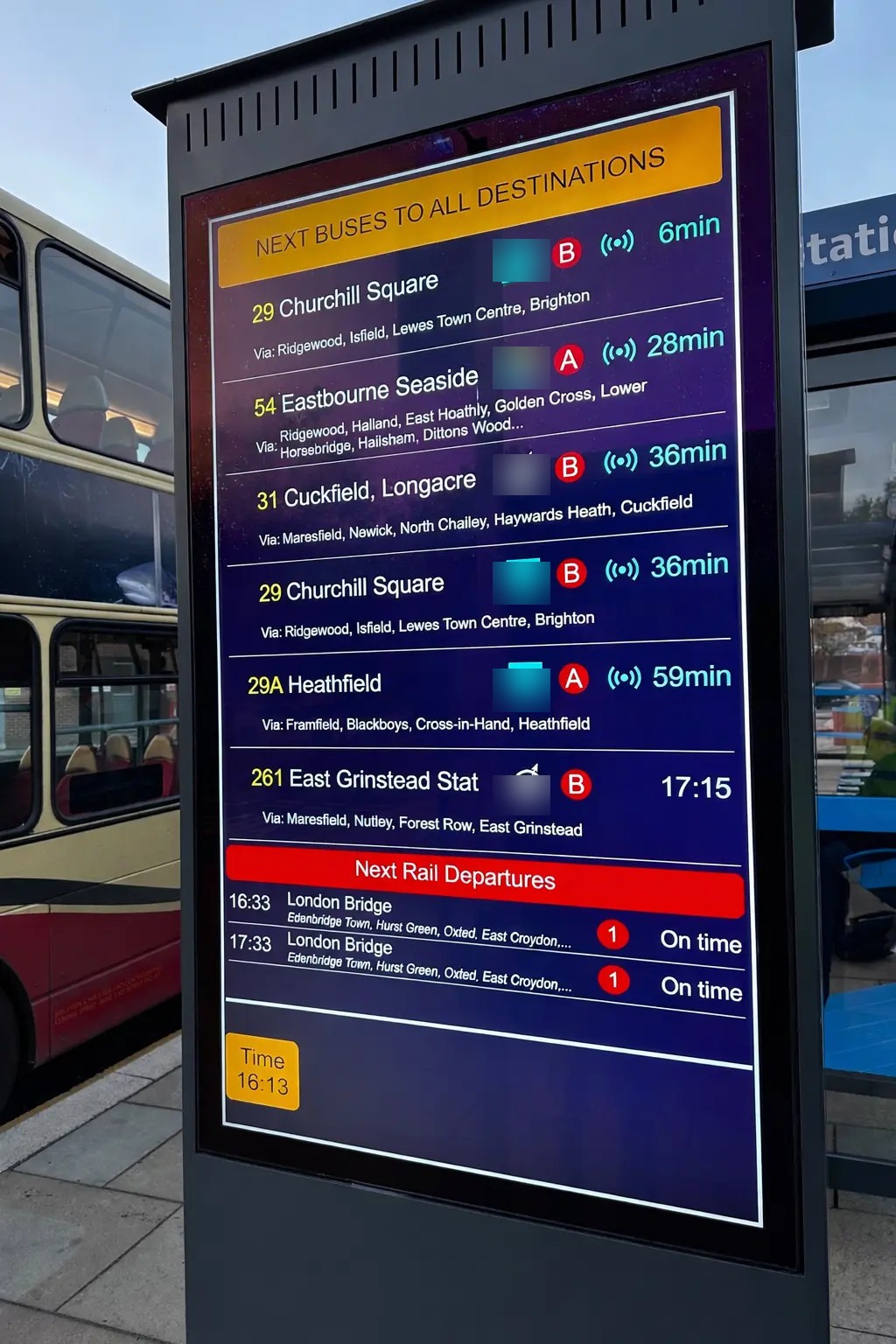 AD Series 65-inch outdoor display totem showing passenger information
